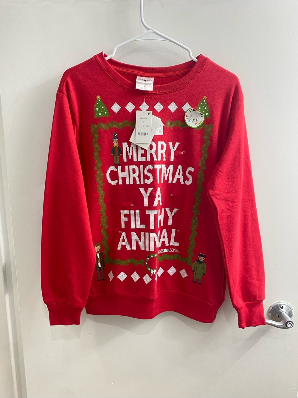 Home Alone Merry Christmas
Light Up Graphic Pullover
Sweater Red Size Small